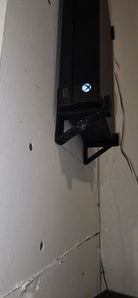Supporto a parete per Xbox One X