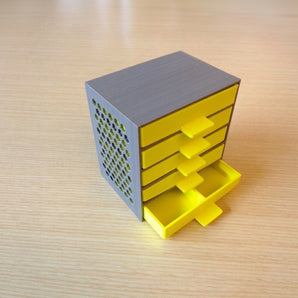 Organizer per cassetto con motivo esagonale per la conservazione