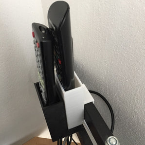 Supporto per telecomando per uno o due dispositivi