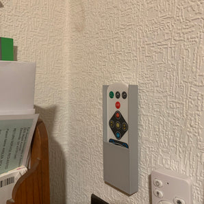 Supporto a parete per telecomando per lampade da soffitto ricaricabili