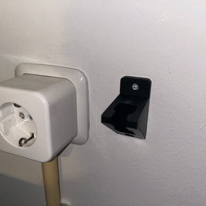 Supporto per cavi elettrici da parete