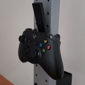 Montaggio a parete per Xbox One con fori per viti e slot USB per il ricevitore